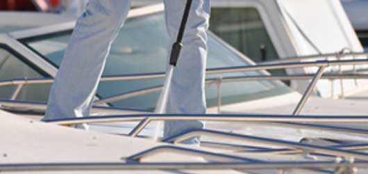 Pressure washing boat