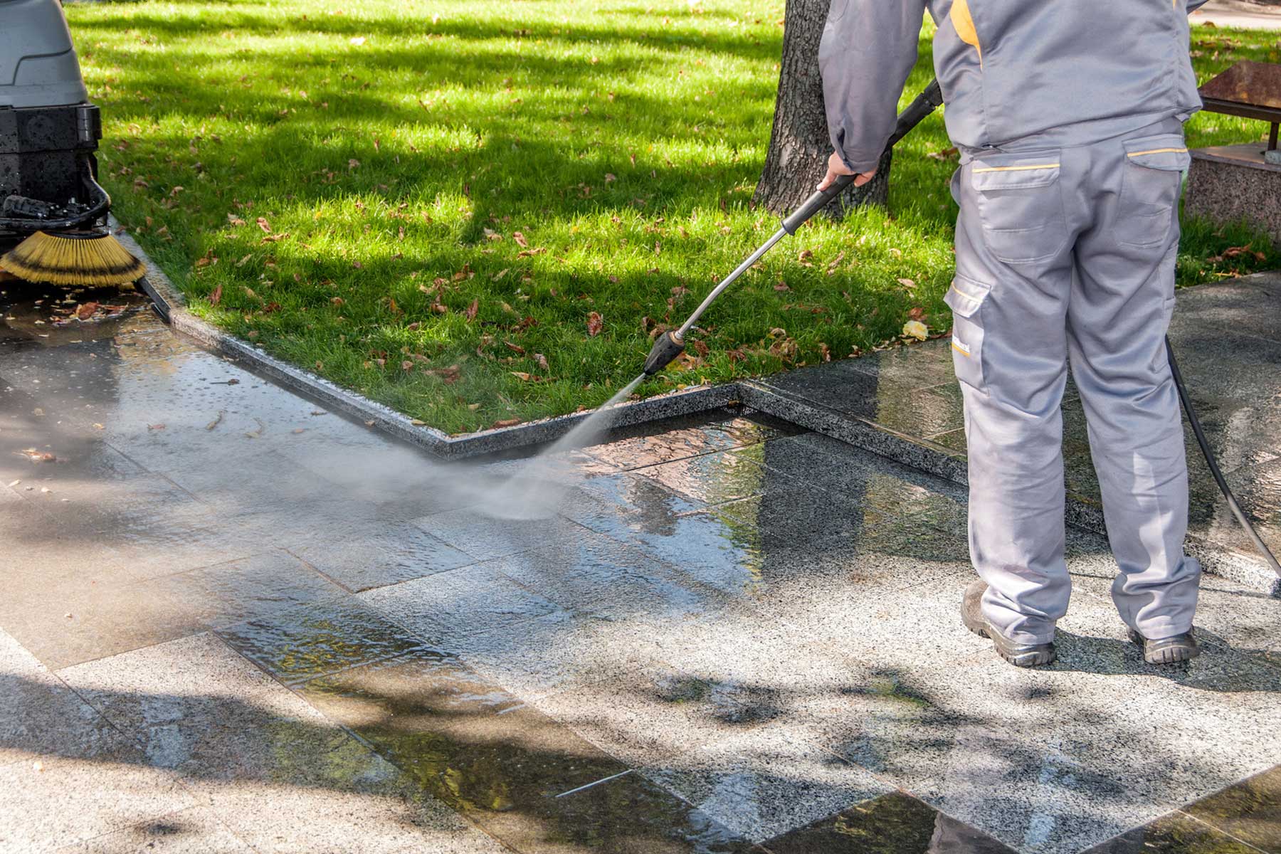 Pressure washing sidewalk